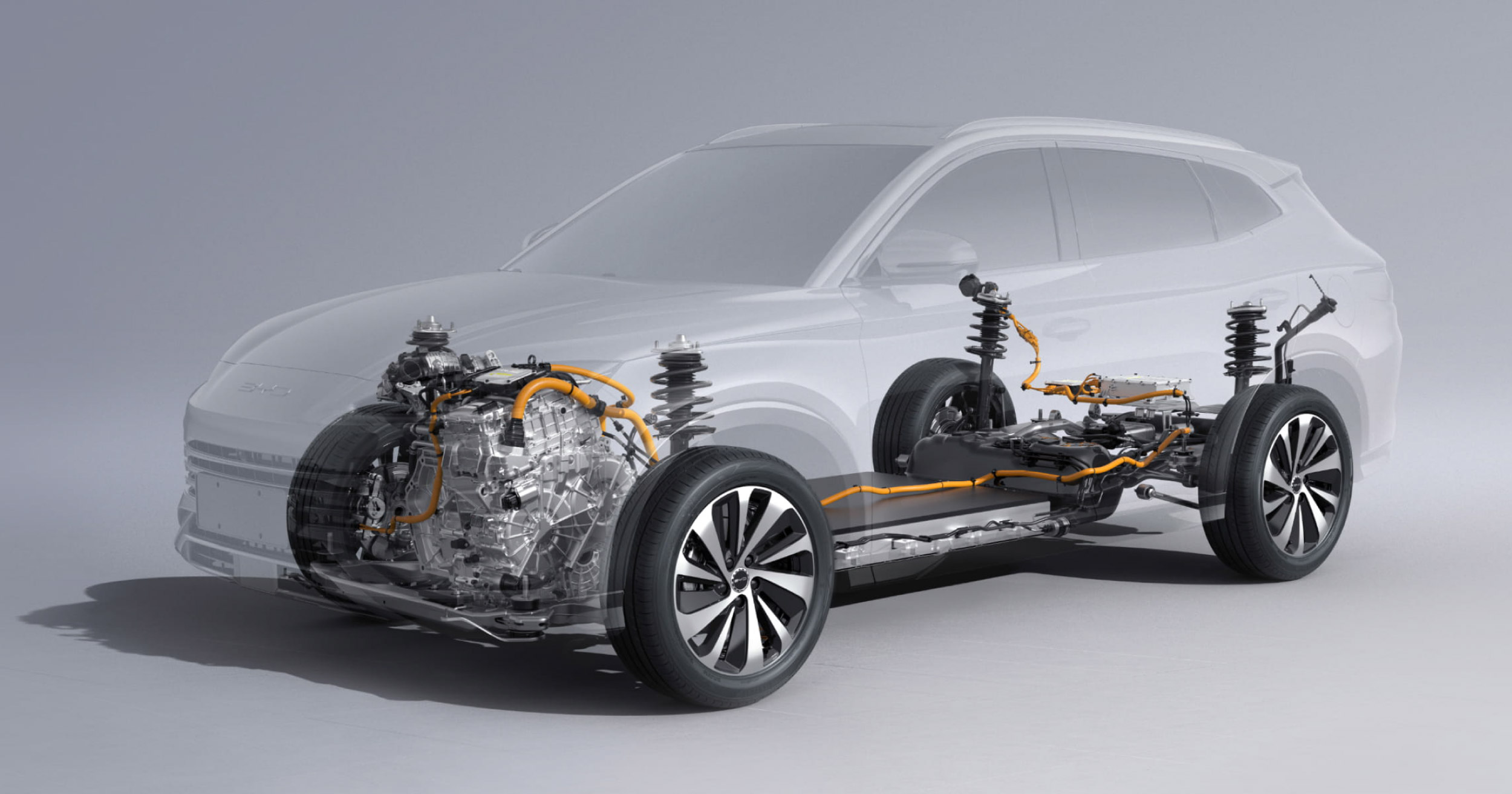 A detailed view of the internal components of a modern electric vehicle, highlighting the engine, suspension, and electrical systems with a transparent car body.